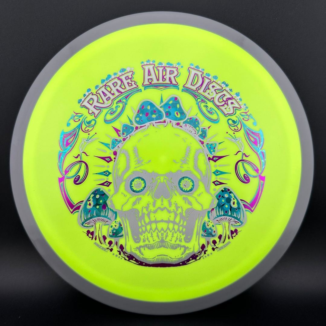 Fission Defy Crushin' Amanitas VIP 2.0 disc golf disc by Rare Air Discs, featuring vibrant artwork and a durable plastic finish.