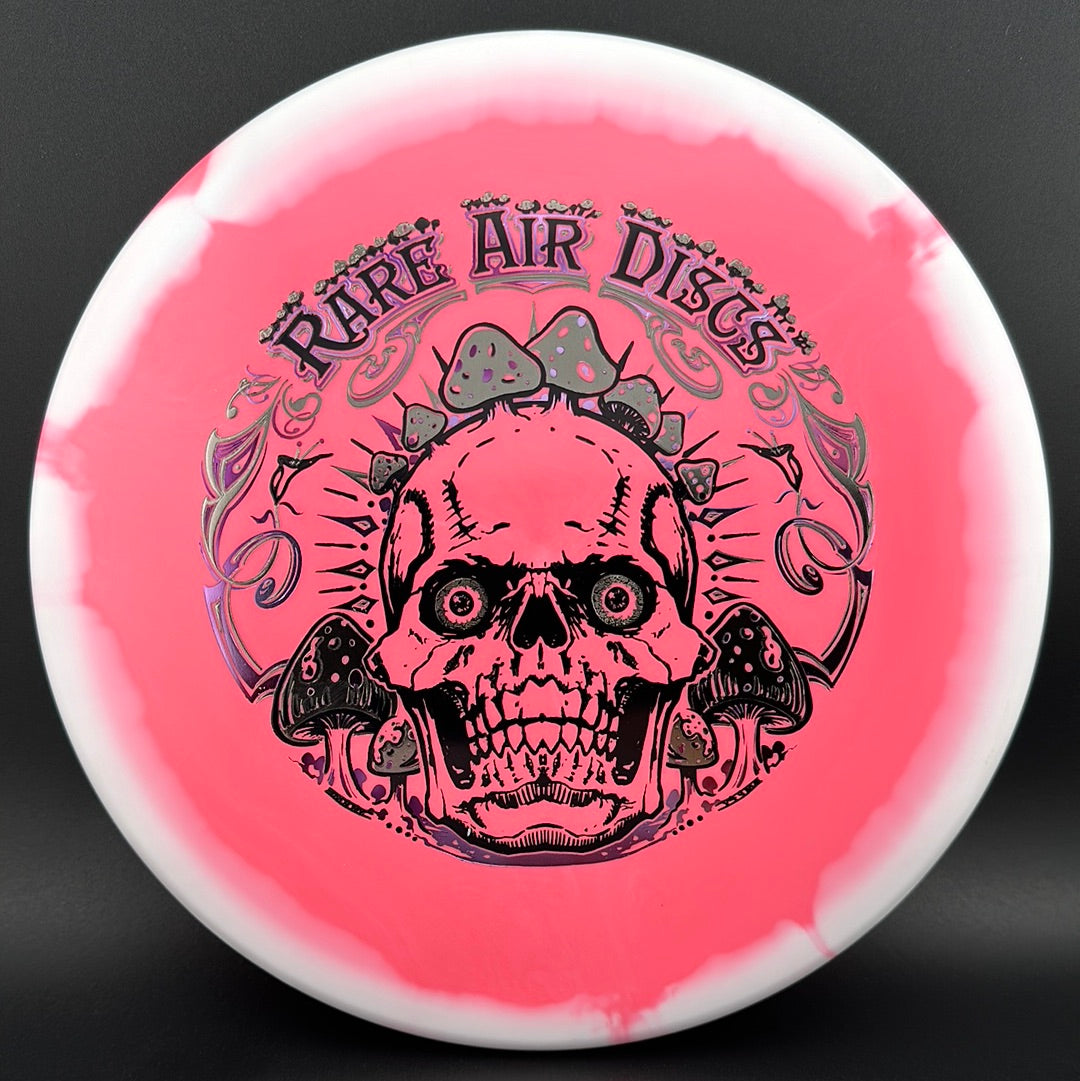 Halo S-Blend Tomb disc golf stamp by Manny Trujillo featuring Crushin' Amanitas design on a Rare Air Discs disc.