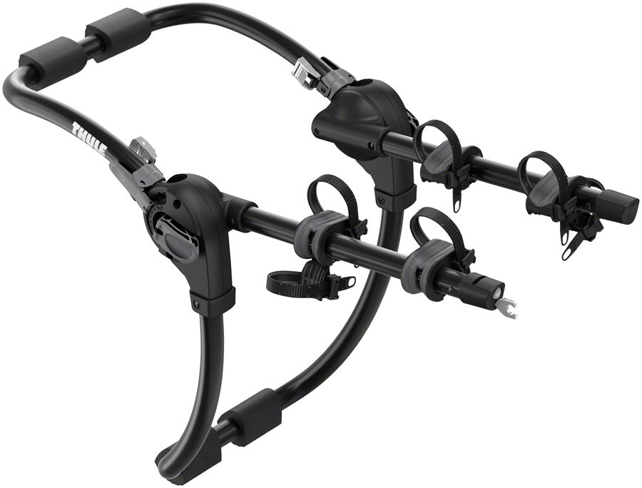 Thule Gateway Pro 2 Trunk Rack for 2 bikes, mounted on a car, showing adjustable arms and secure bike support.
