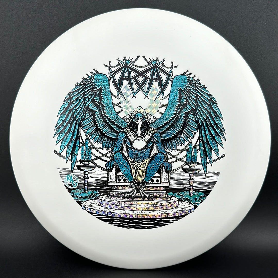 ESP Glo Buzzz disc golf disc by Rare Air Discs featuring Karudi the Overseer design from Cult of RAD, glowing in the dark.