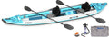 Backcountry Sportsman 465ft FastTrack™ V-bottom two-person kayak on water, showcasing sleek design and spacious interior.
