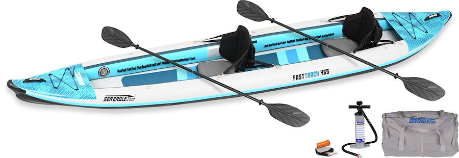 Backcountry Sportsman 465ft FastTrack™ V-bottom two-person kayak on water, showcasing sleek design and spacious interior.