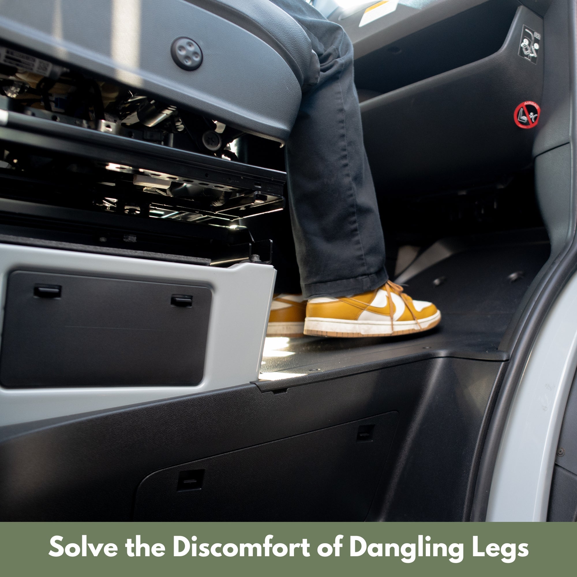 Sprinter Footrest Storage by The Van Mart featuring a durable design in a van interior setting for organized storage solutions.