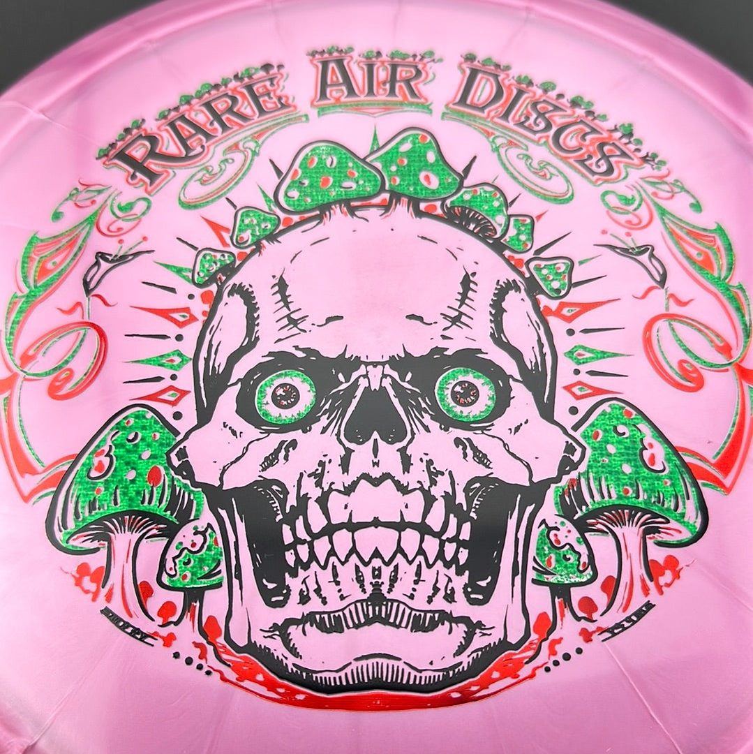 Ethereal Construct Crushin' Amanitas disc golf stamp by Manny Trujillo on Rare Air Discs disc golf disc with colorful mushroom design.