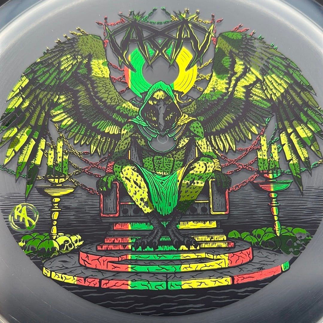 CryZtal Buzzz disc golf disc by Rare Air Discs featuring Karudi the Overseer artwork on a clear CryZtal Buzzz.
