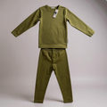 Keep the Littles Wild premium kids merino wool base layer in sage, showcasing the ultra-soft thermal underlayer for warmth.