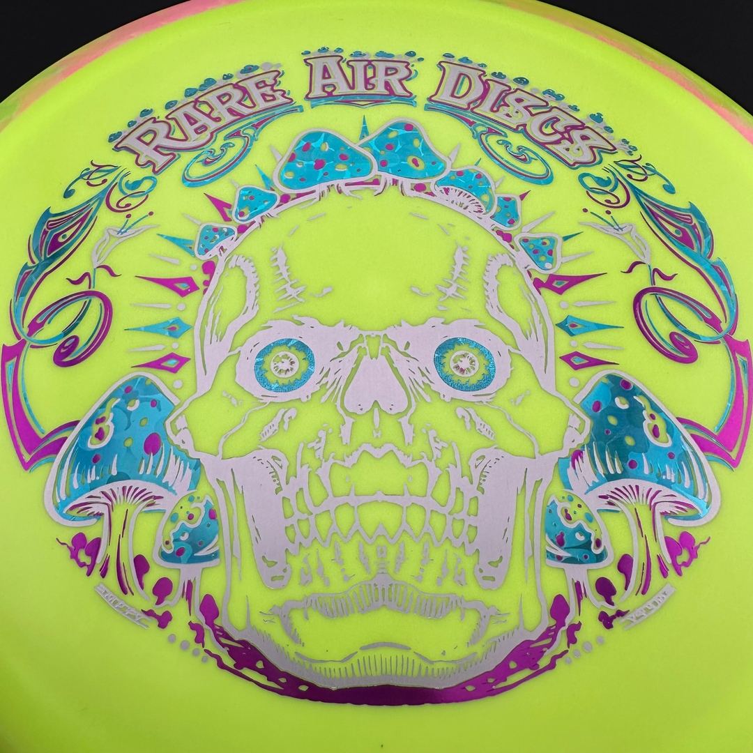 Fission Defy Crushin' Amanitas VIP 2.0 disc golf disc by Rare Air Discs, showcasing vibrant design and flight features
