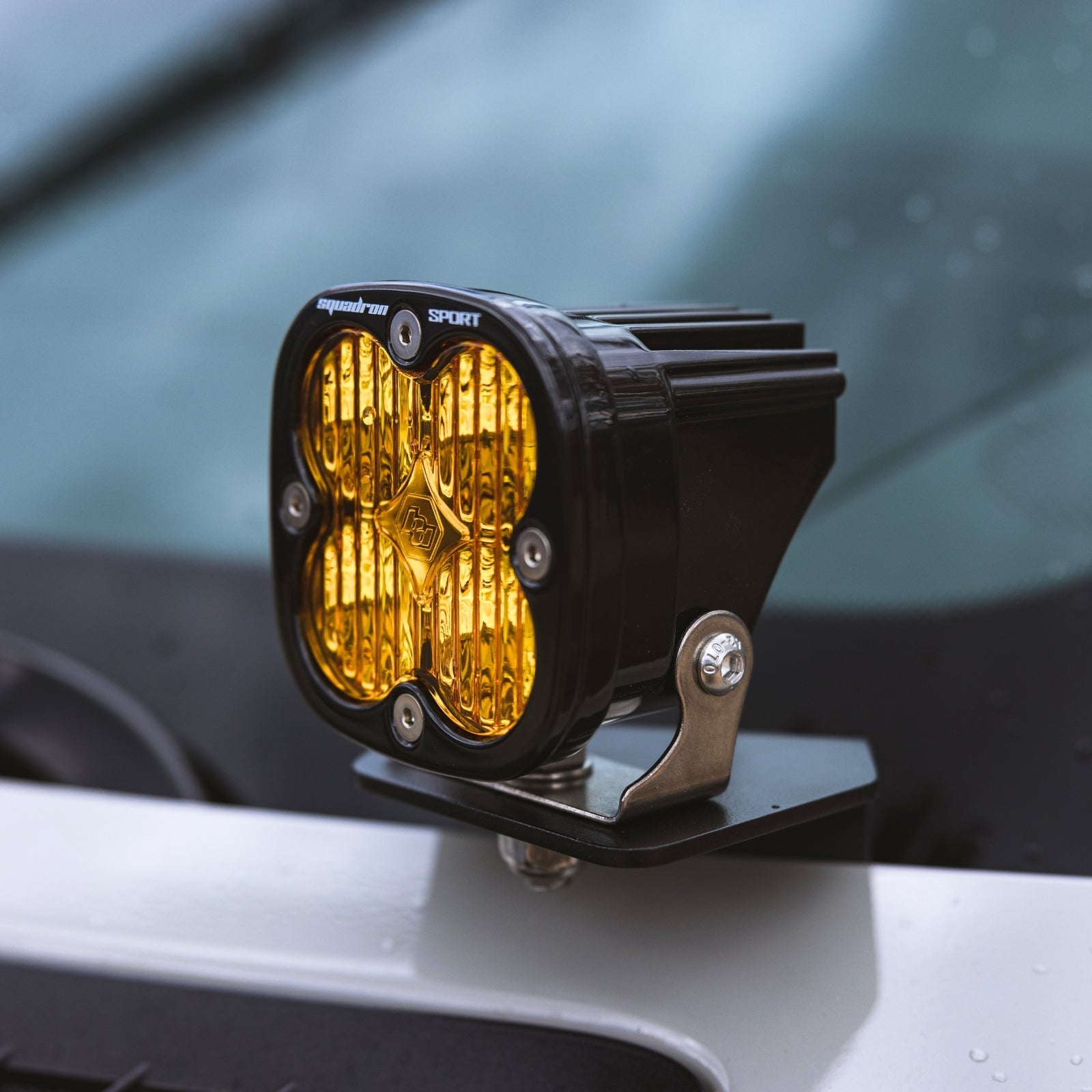 Sprinter Hood Light Mount Kit by The Van Mart, showcasing sturdy brackets and hardware for easy installation.