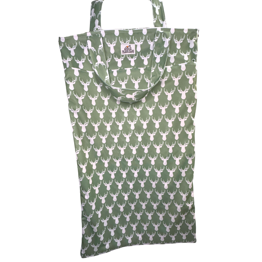 Large hanging wetbag with antler pattern from The Good Village Cloth Co. for storing wet clothes or swimwear.