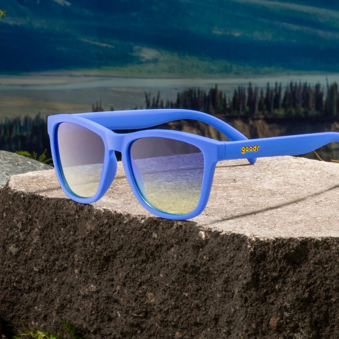 Blue Lobster's SCUBA Revenge OG polarized sunglasses with packaging, featuring sleek blue frames and lens details.