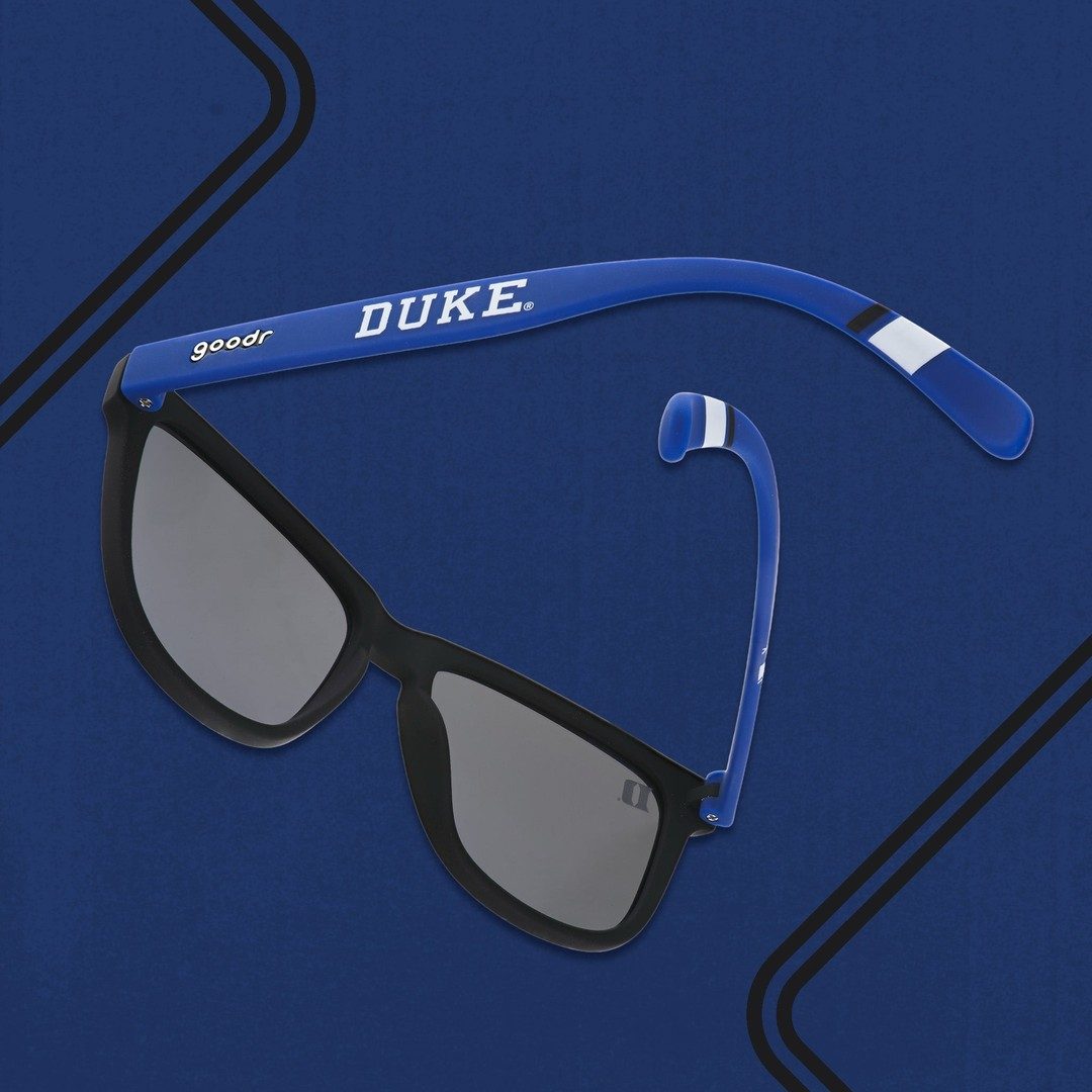 Royal Blue Duke Collegiate OG polarized sunglasses with packaging from Rare Air Discs, featuring sleek design and reflective lenses.