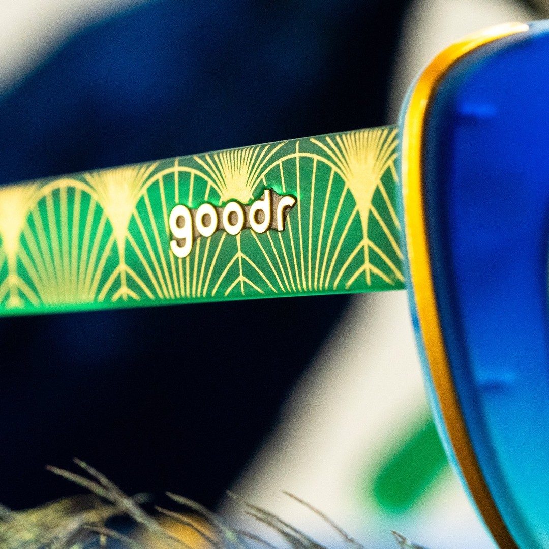 Rhonda's Peacock Palace Glam G polarized sunglasses with ornate peacock design in packaging, by Rare Air Discs.