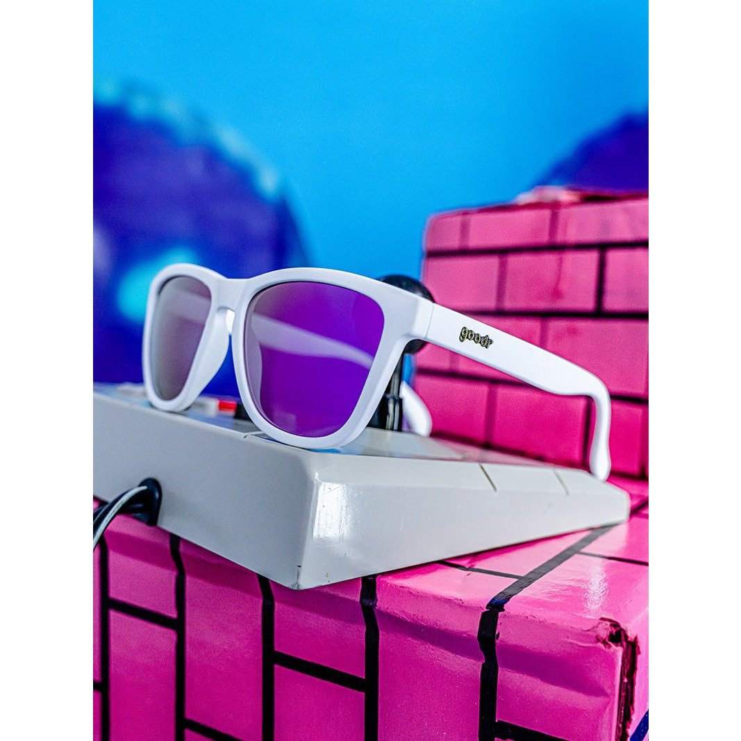 Rare Air Discs Side Scroll Eye Roll OG polarized sunglasses in packaging with sleek black frames and tinted lenses.