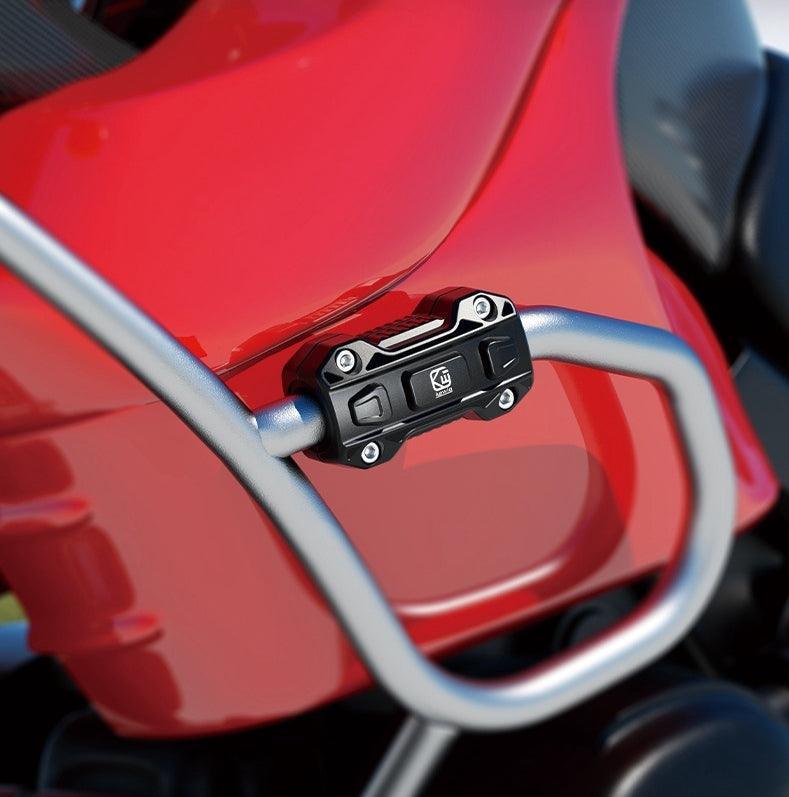 Bean's Moto Booth motorcycle crash bar protection buffer block attached to bike frame for impact protection and durability.