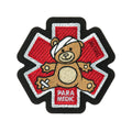 M-TAC embroidered patch featuring a paramedic bear design on a textured background.