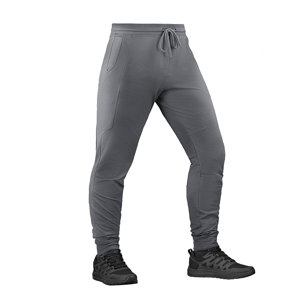 M-Tac Stealth Active sweat pants in black with adjustable drawstrings and multiple pockets, designed for tactical and active wear.