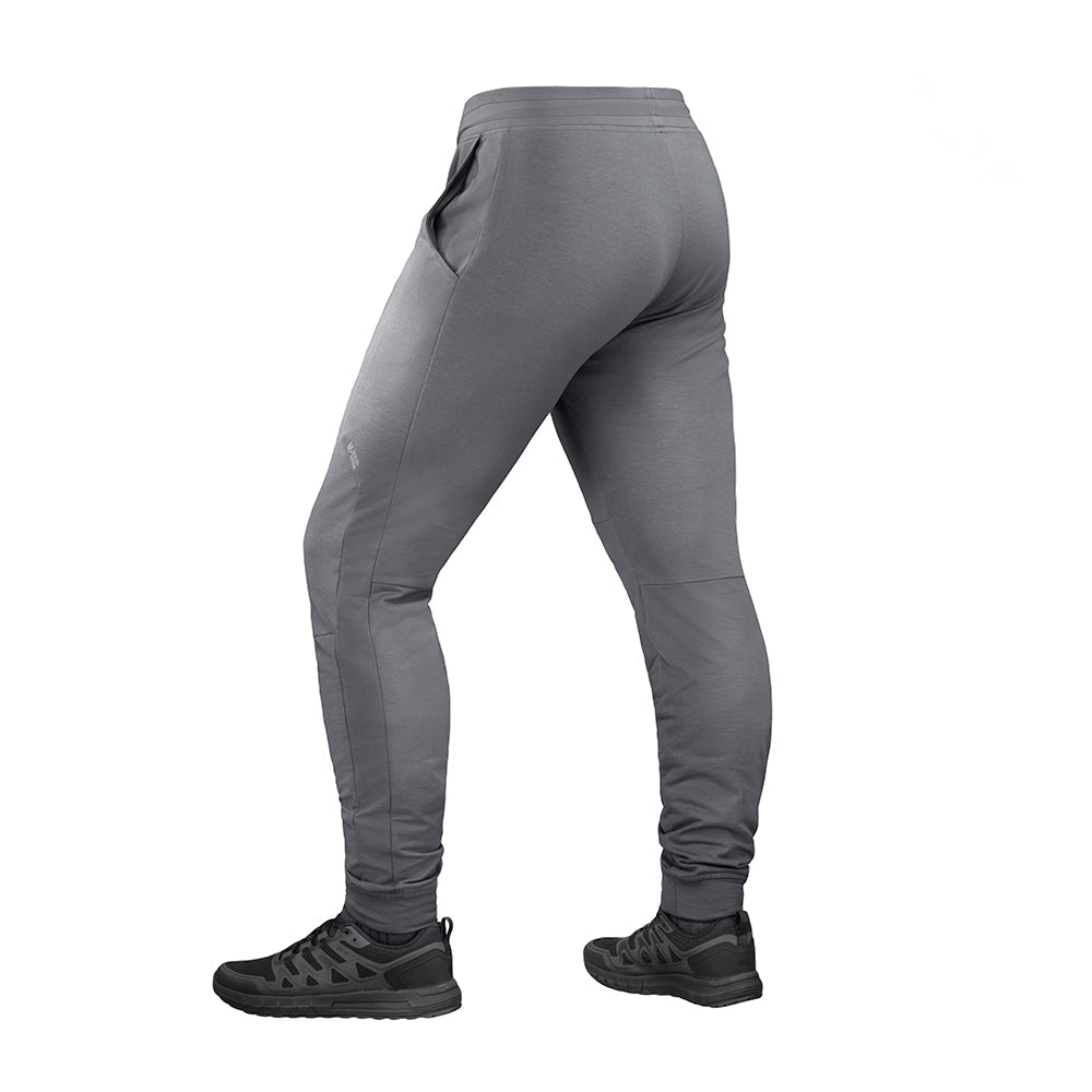 M-Tac Stealth Active sweat pants in black with adjustable waistband and multiple pockets, designed for tactical and active wear.