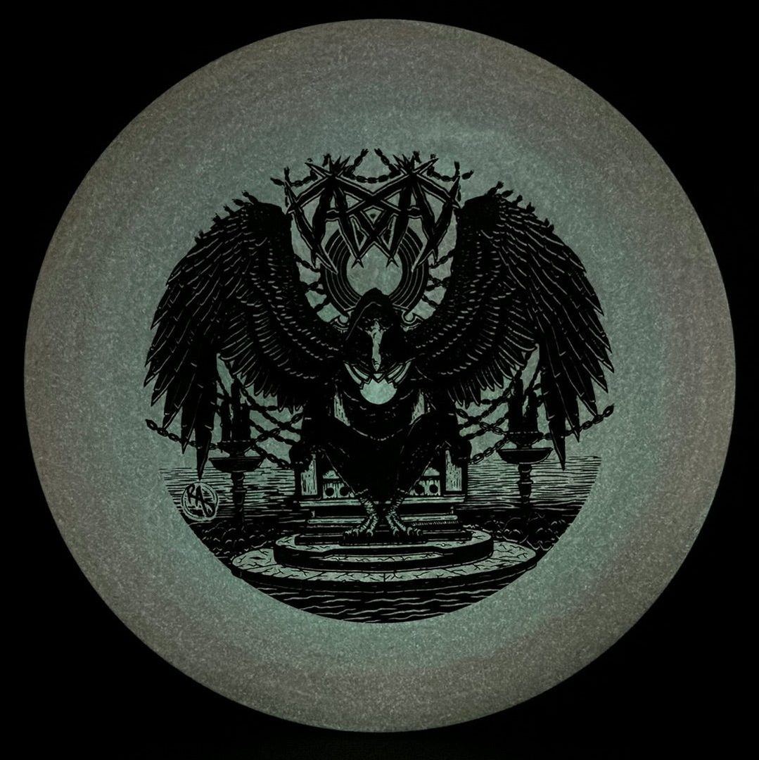 Disc golf disc ESP Glo Buzzz by Rare Air Discs featuring Karudi the Overseer design, glowing purple and green with detailed artwork.