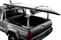 Backcountry Sportsman Thule Xsporter Pro roof racks mounted on a vehicle, showcasing durable aluminum construction and versatile cargo capacity.