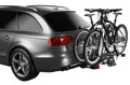 Backcountry Sportsman Thule EasyFold XT 2 bike rack mounted on a vehicle, showcasing its compact foldable design and secure bike holding arms.