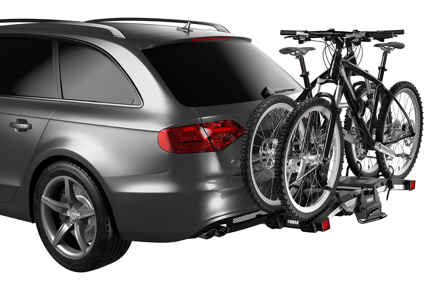 Backcountry Sportsman Thule EasyFold XT 2 bike rack mounted on a vehicle, showcasing its compact foldable design and secure bike holding arms.
