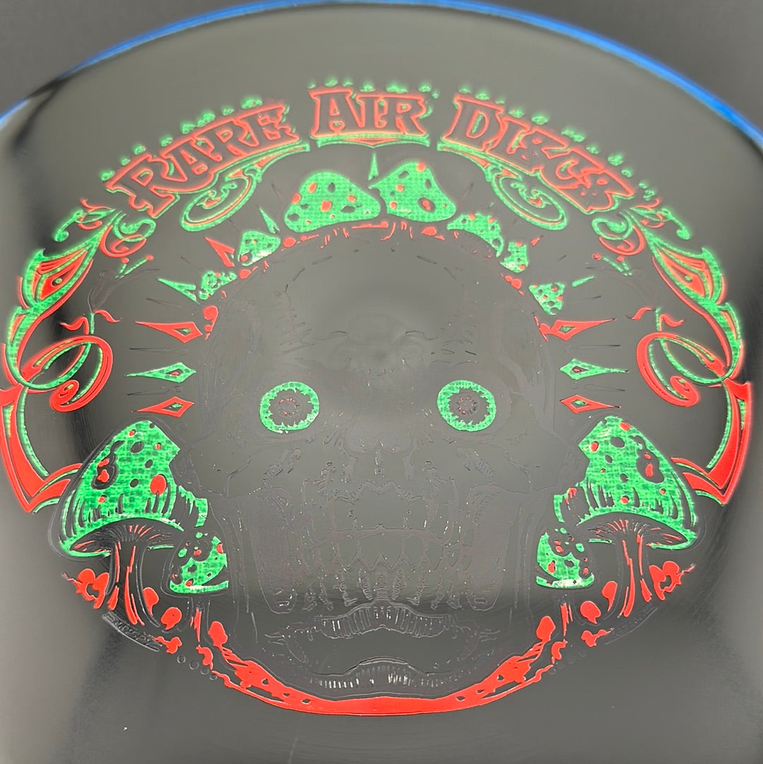 Disc golf disc from Rare Air Discs, Halo S-Blend Tomb Crushin' Amanitas stamp by Manny Trujillo with vibrant design and branding.
