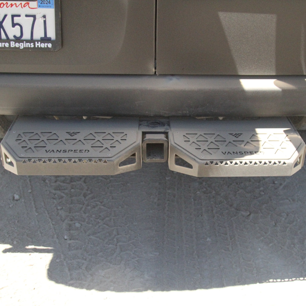 Sprinter Defender Mini Rear Step by The Van Mart, showcasing a durable exterior part designed for easy access to vans.