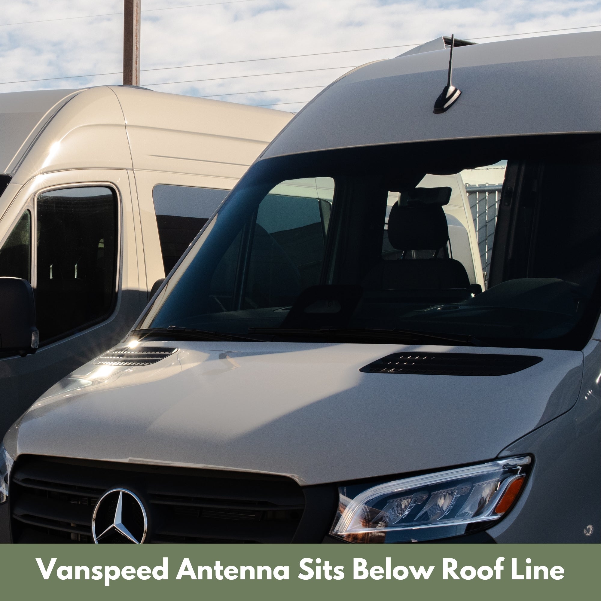 Sprinter short antenna by The Van Mart, close-up of compact vehicle antenna with mounting base on a white background.