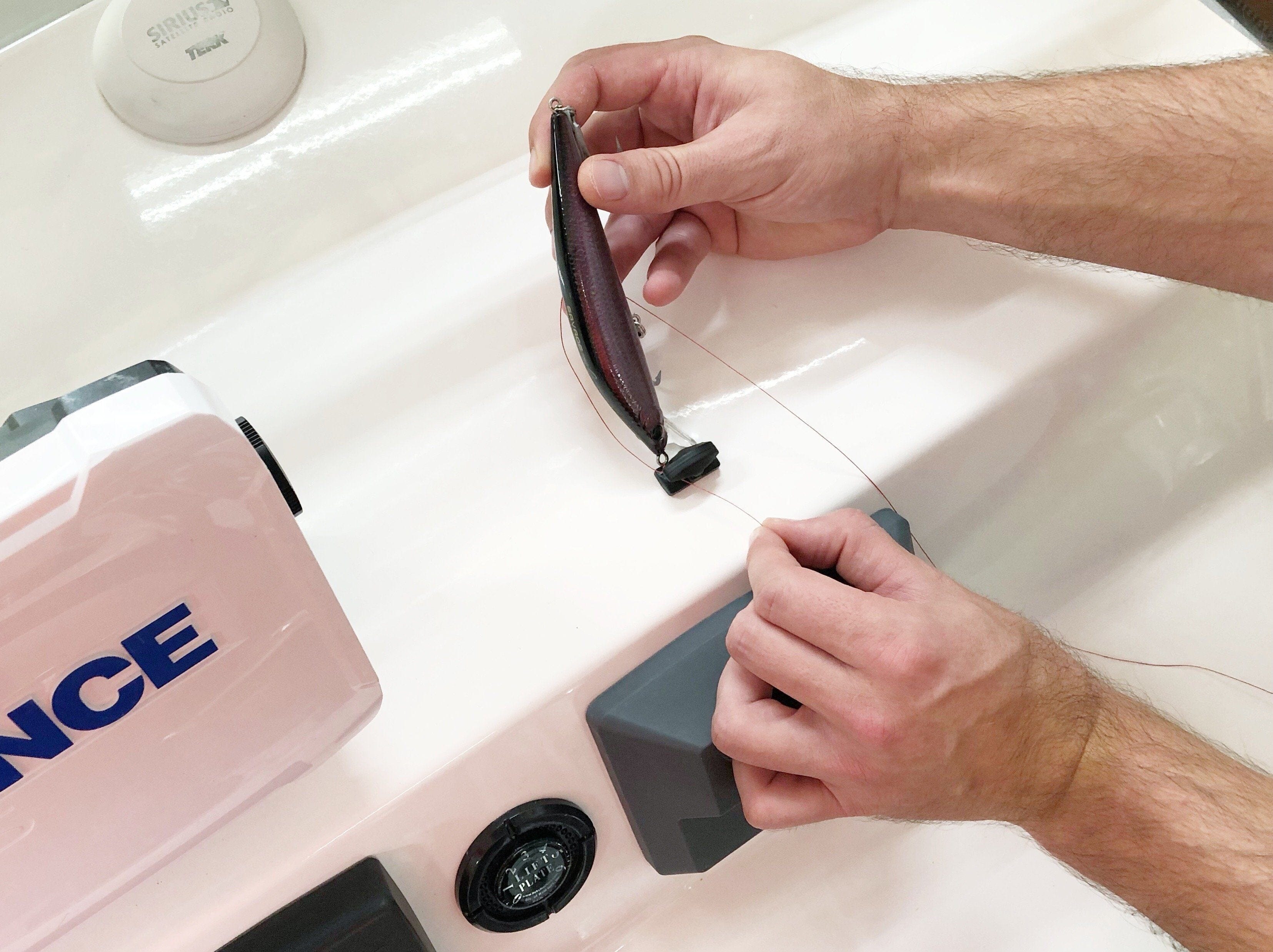 Line Cutterz Flat Mount with Blaze Orange ceramic blade peel and stick for precision cutting and mounting applications.