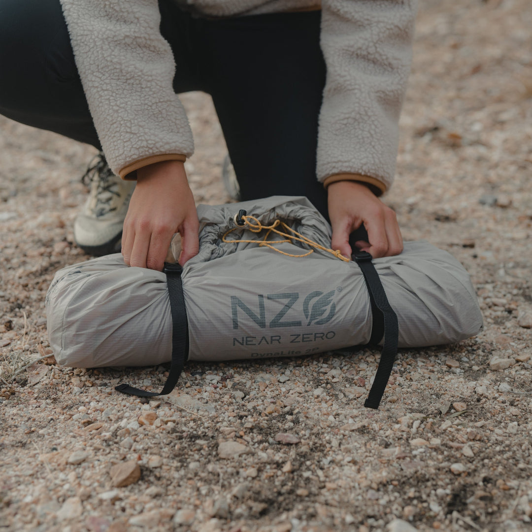 Near Zero Outdoor Gear tent compression bag, showcasing its durable material and compact design for easy storage.