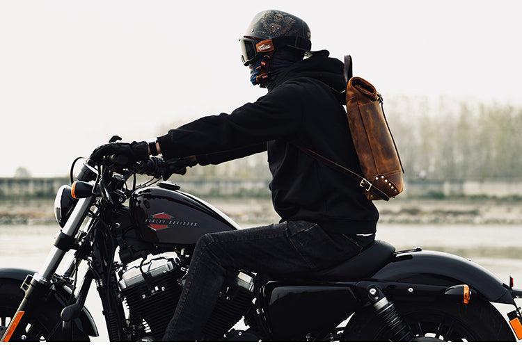 Bean's Moto Booth Filed Leather™ vintage roll-top motorcycle backpack made from crazy horse cowhide leather with adjustable straps and front pocket.