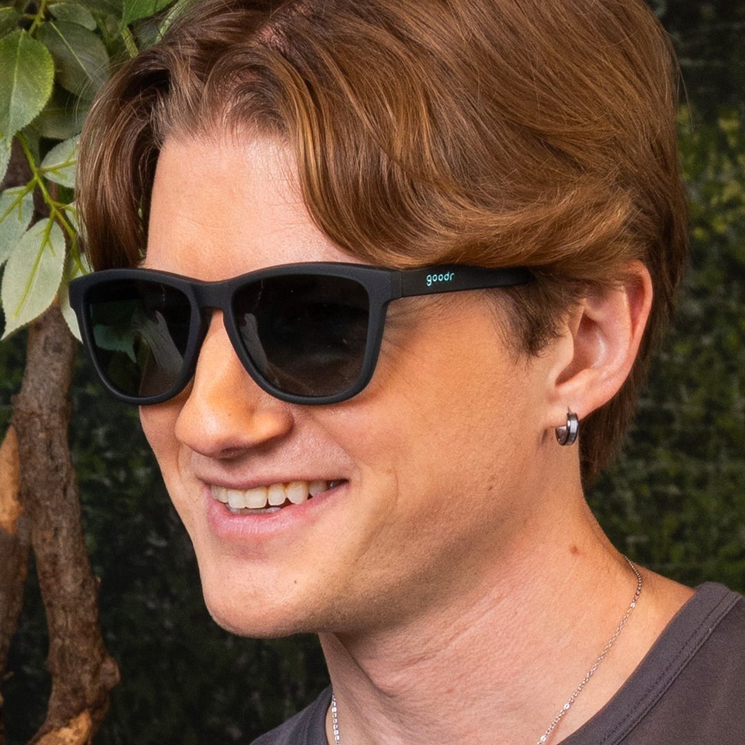Pair of 90s Sedan Style Icon OG polarized sunglasses by Rare Air Discs, showcasing the classic frame and tinted lenses.