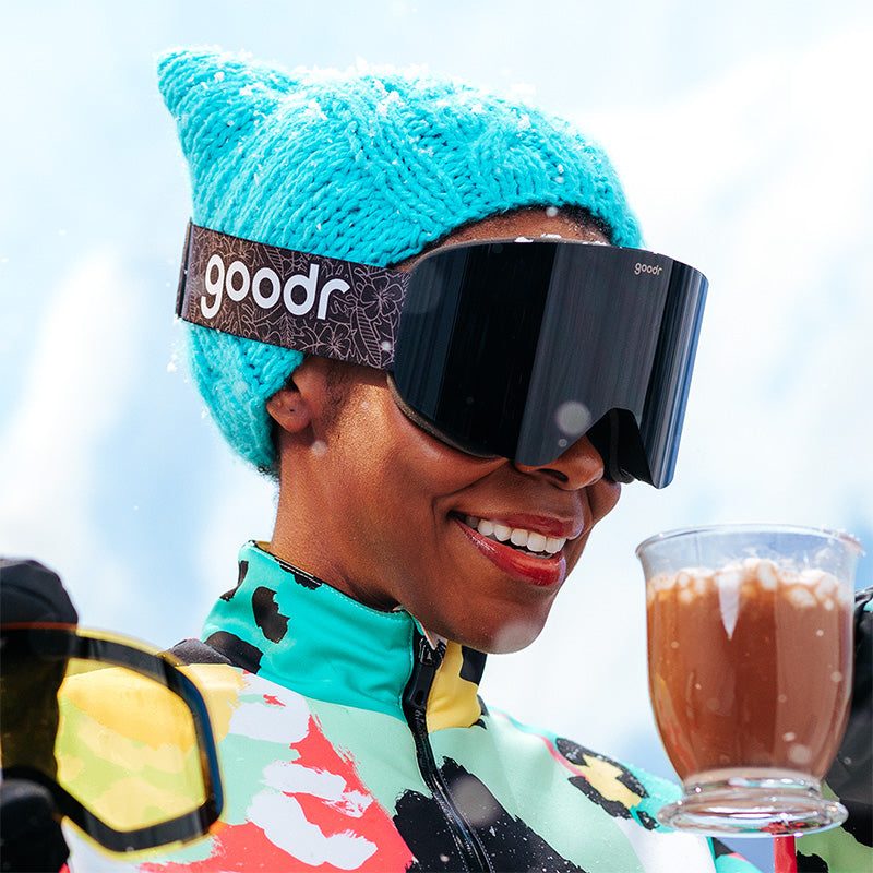 Rare Air Discs Apres All Day Snow G's polarized goggles with black frame and tinted lenses, designed for winter sports accessories.