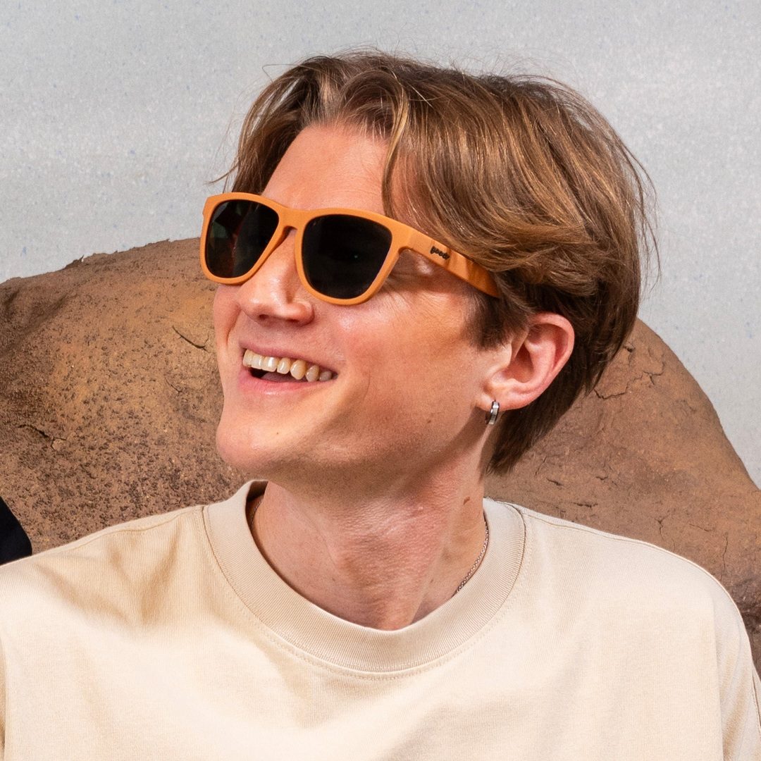 Rare Air Discs Chocolatier's Caramel Hot Tub polarized sunglasses with orange-tinted lenses and stylish frame, accessory for sunny days.