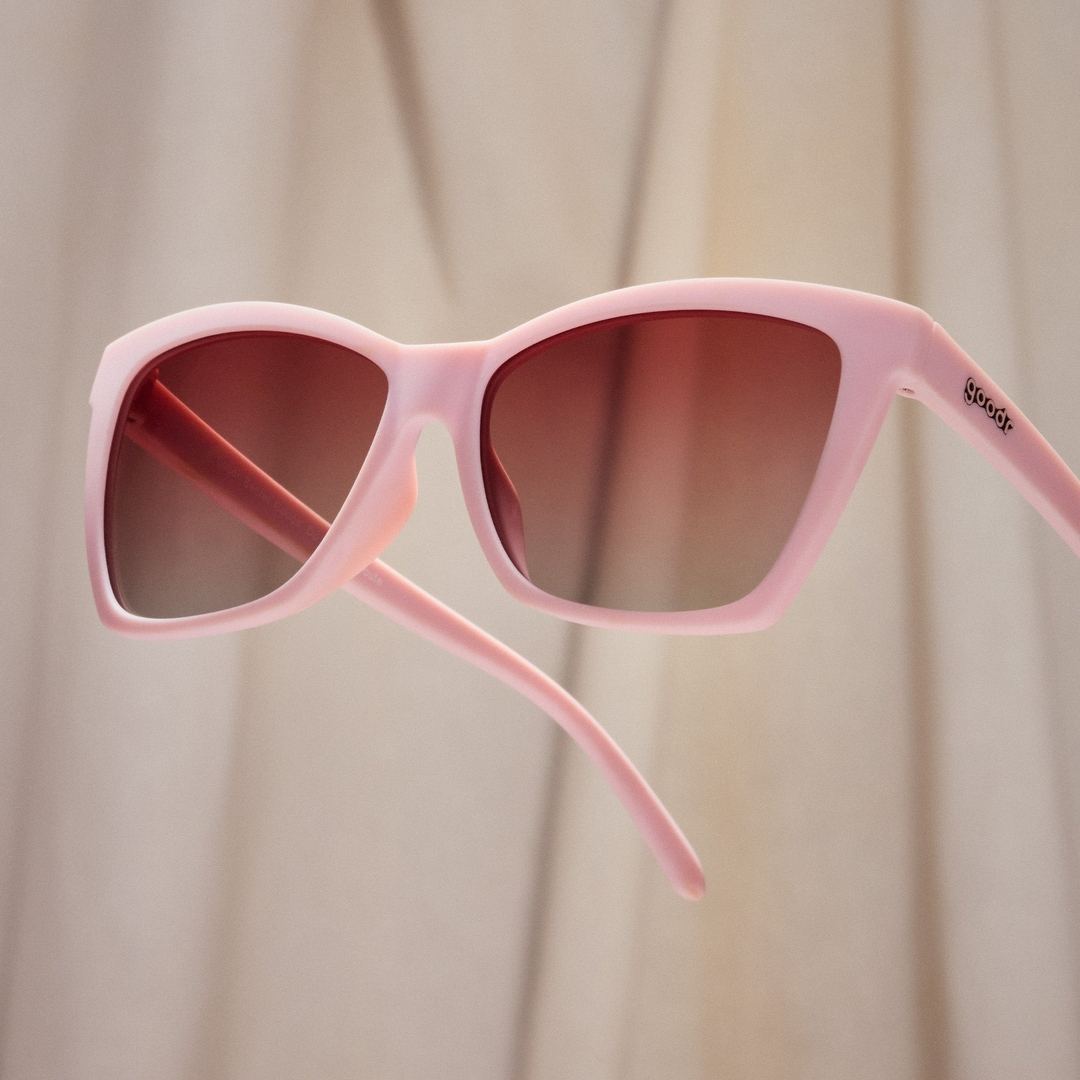 Rare Air Discs Rosé Retail Therapy polarized Pop G sunglasses with pink tinted lenses and stylish frame, accessories for sun protection.