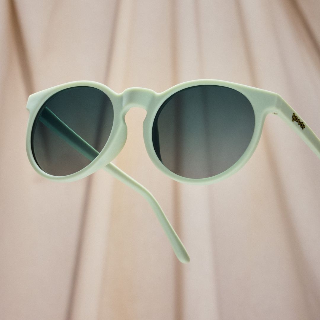 Rare Air Discs Incognito Plant Parent Circle G polarized sunglasses with black frames and tinted lenses, stylish accessories for outdoor wear.