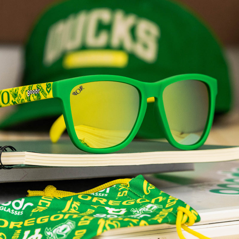 Polarized "Quack Attack" Limited Oregon Collegiate OG sunglasses by Rare Air Discs, with black frames and tinted lenses.