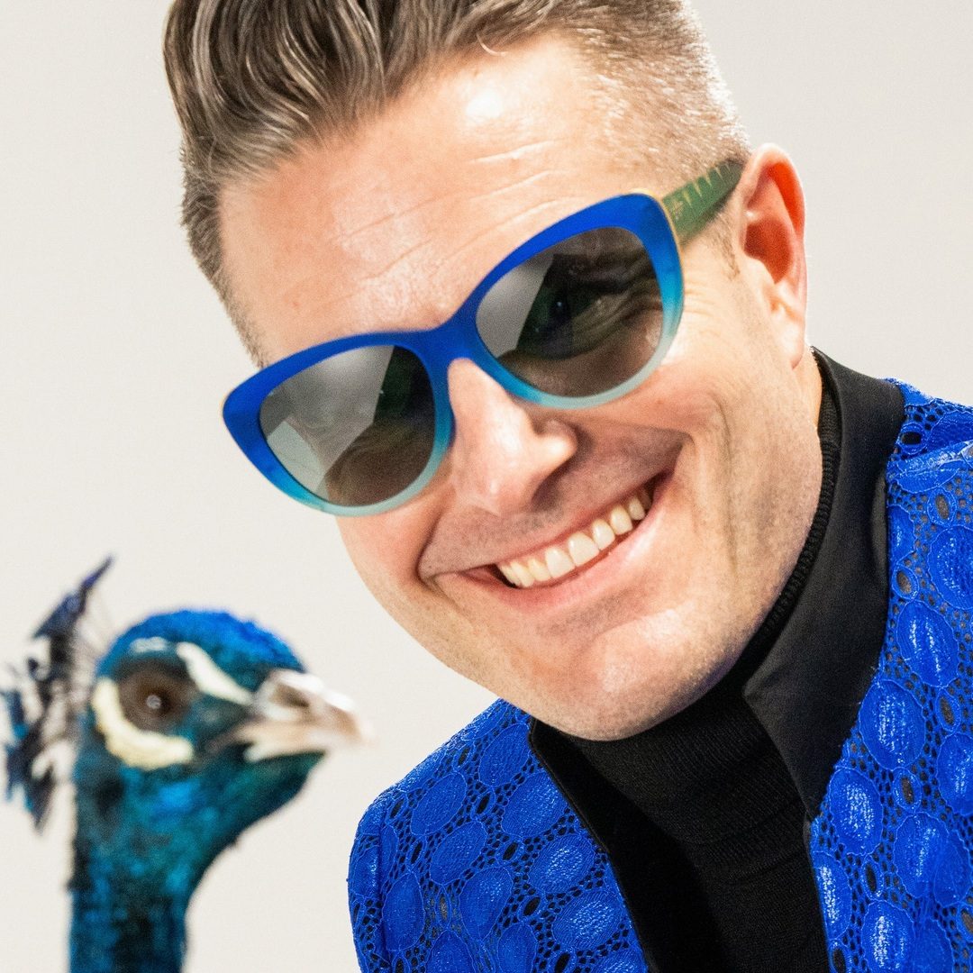 Rhonda's Peacock Palace Glam G polarized sunglasses with colorful peacock feather design and stylish frame, accessories by Rare Air Discs