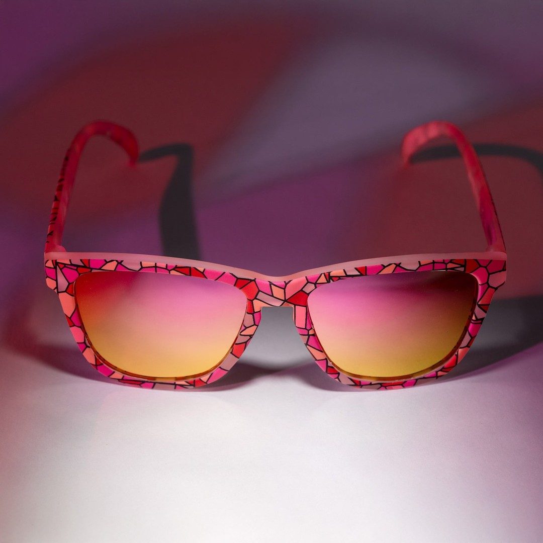 Stained glass sex symbol design on Rare Air Discs polarized sunglasses with colorful, artistic lenses and frame.