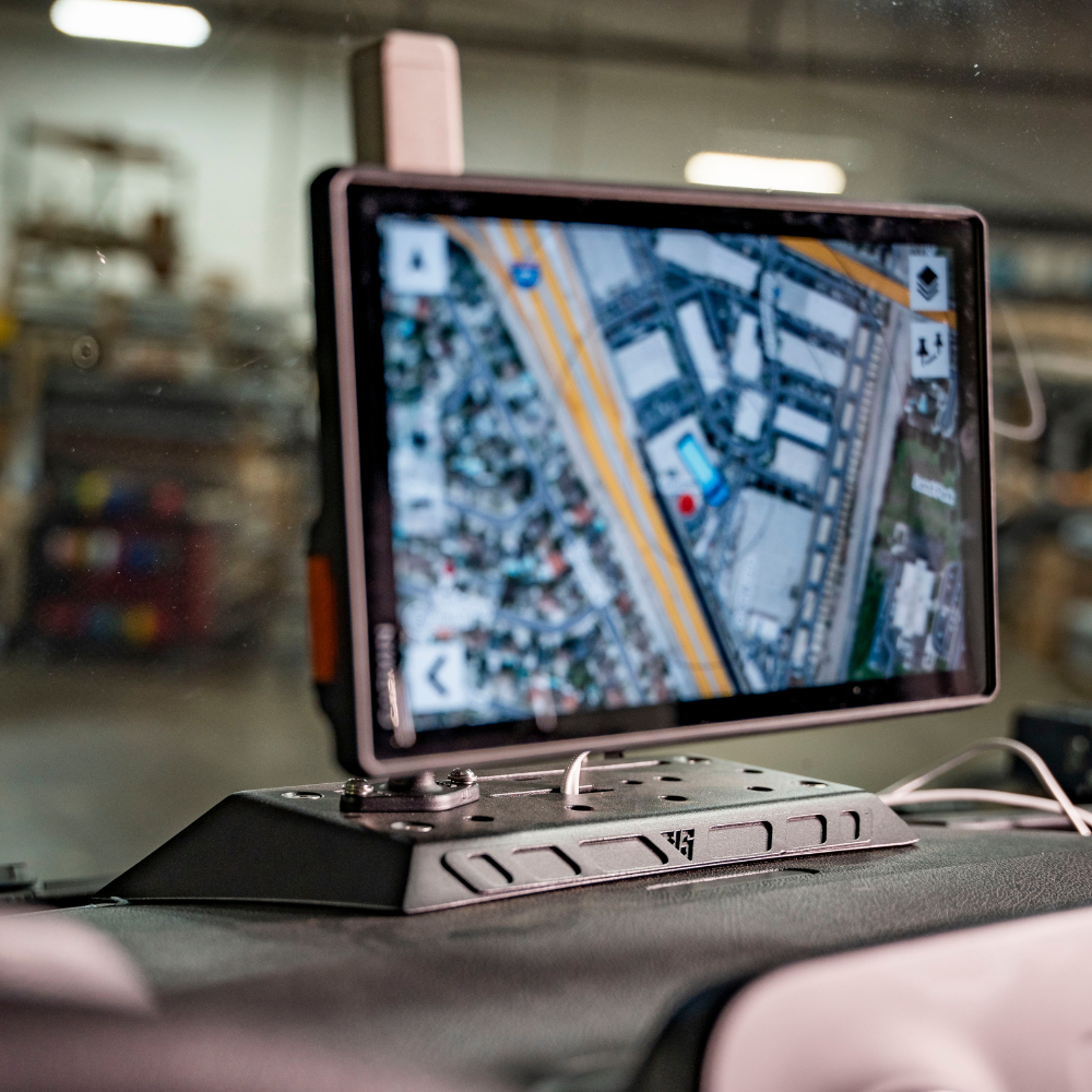 Sprinter Dashboard Mount by The Van Mart, featuring a secure holder for navigation and communication devices.