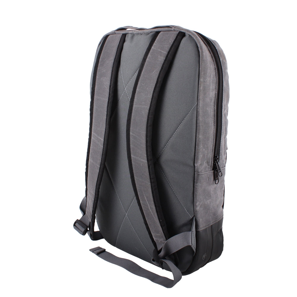 ZEITBIKE Alchemy Goods Brooklyn Waxed Backpack shown from back left, made in the USA, durable waxed canvas bag for everyday use.