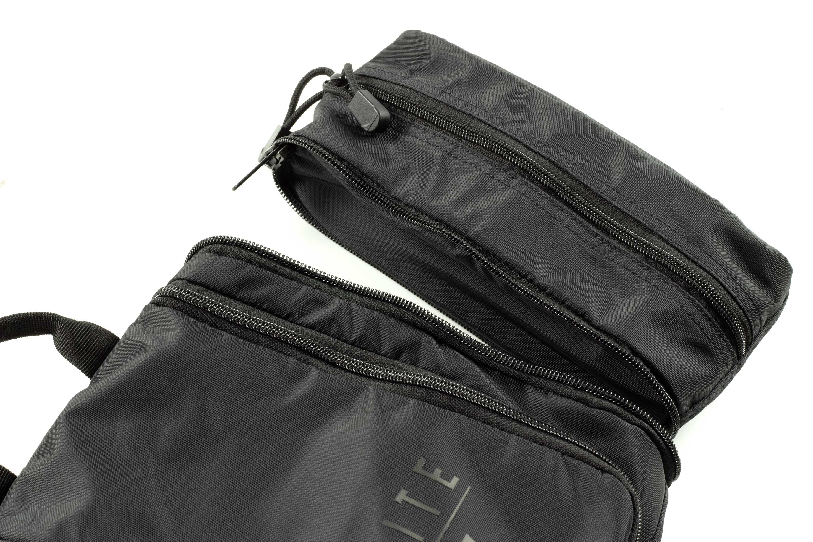Elite Survival Systems Travel Prone™ Toiletry Kit in luggage with zipper closure and multiple compartments for organized travel storage.