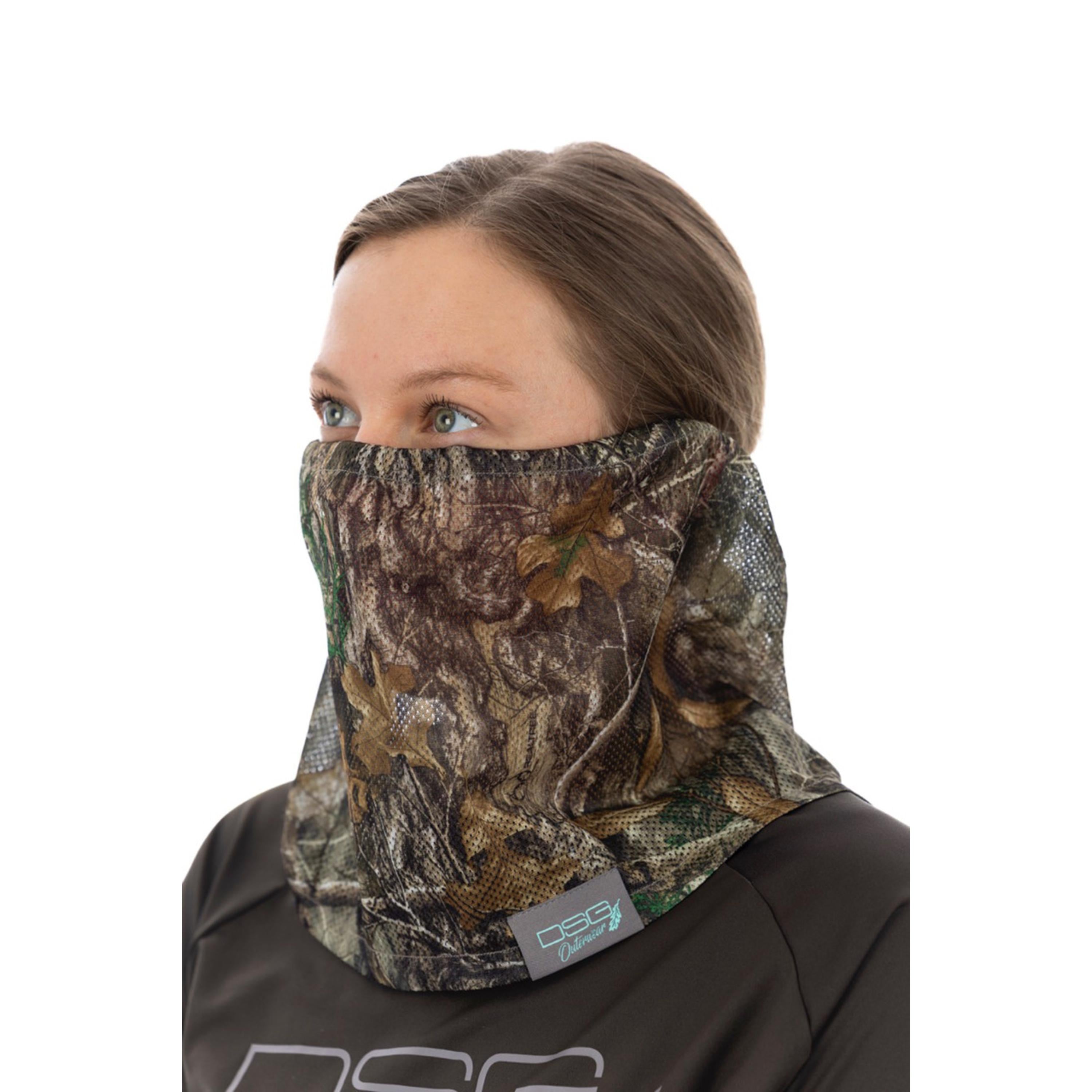 Close-up of DSG OUTERWEAR mesh face mask showing breathable fabric and secure ear straps.