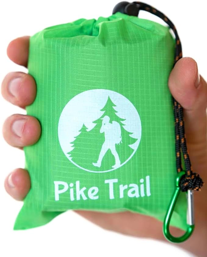 Pike Trail pocket blanket in compact, portable design, perfect for outdoor picnics and camping on grassy surfaces.