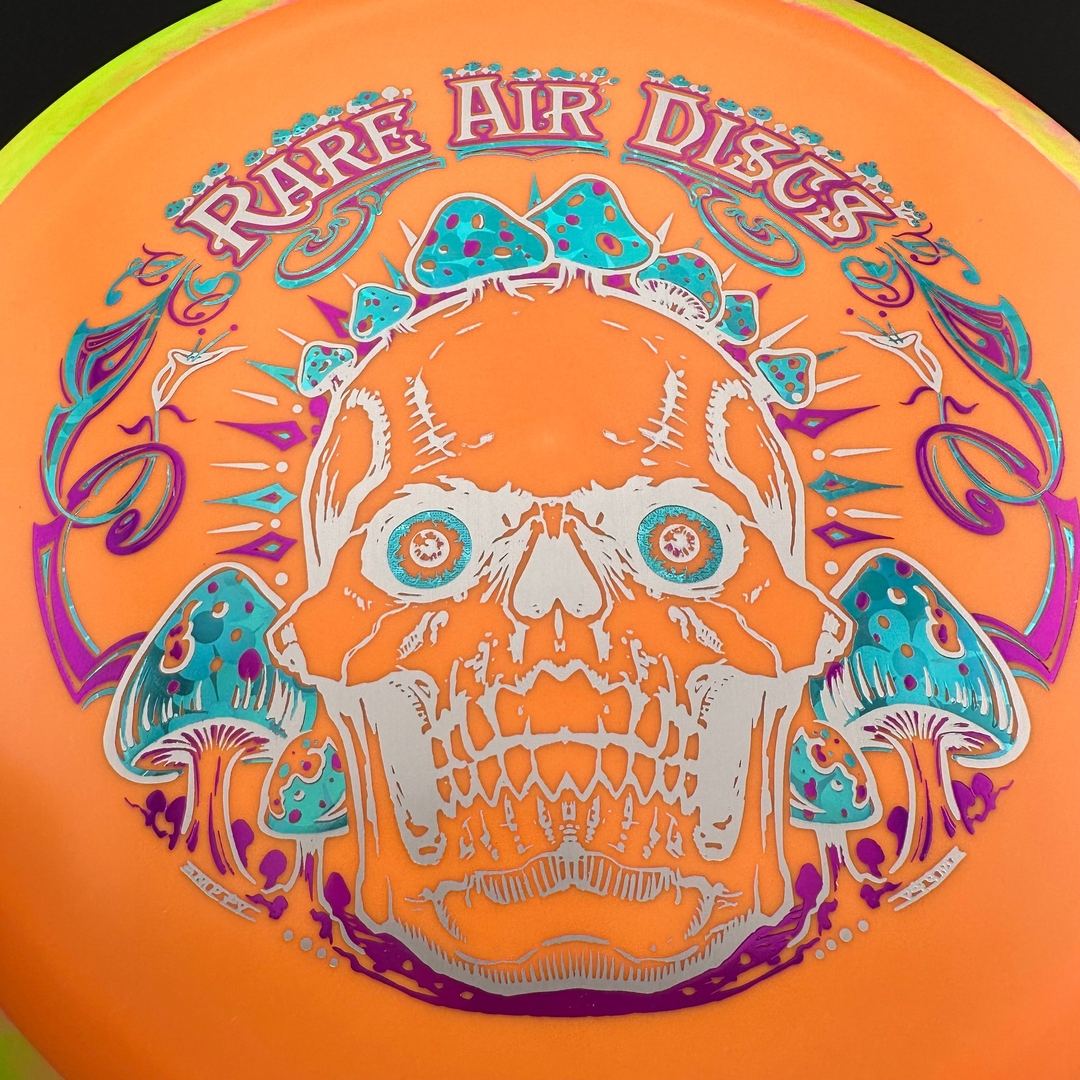 Rare Air Discs Fission Defy Crushin' Amanitas VIP 2.0 disc golf disc with vibrant design and detailed markings on the flight surface.
