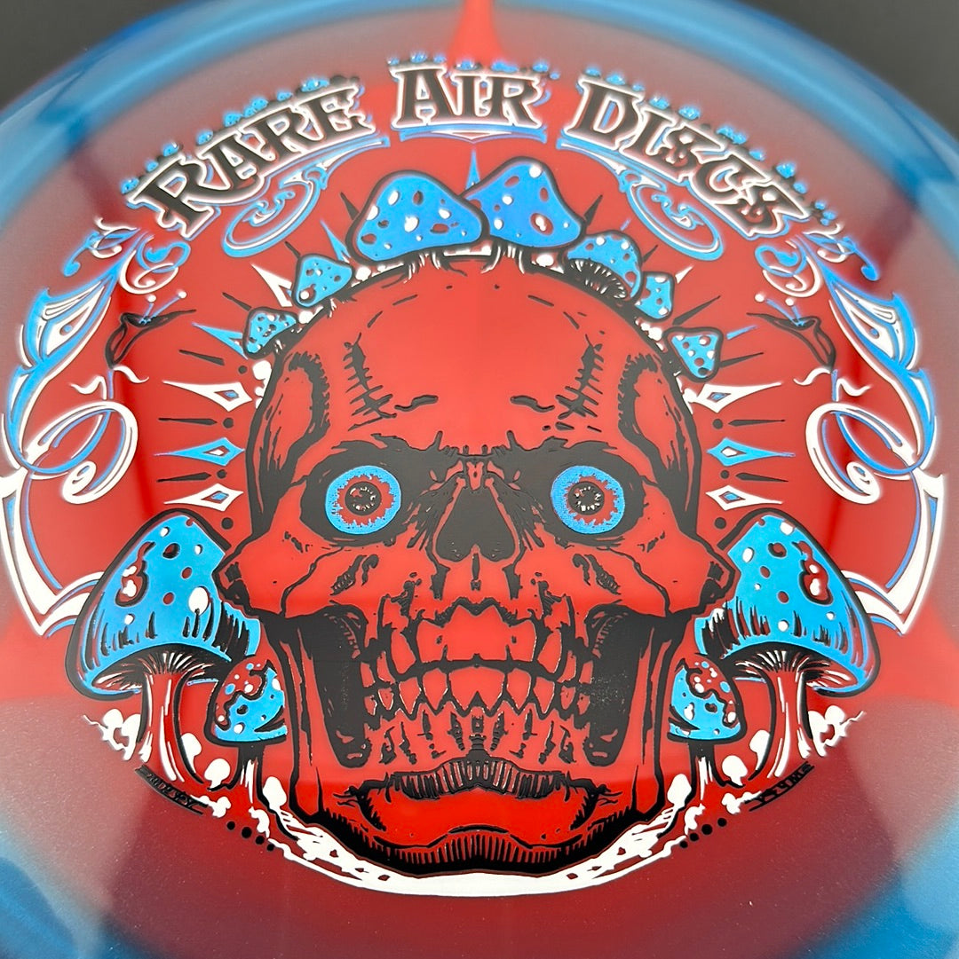 Rare Air Discs Halo S-Blend Conqueror disc golf disc featuring vibrant Crushin' Amanitas artwork by Manny Trujillo.
