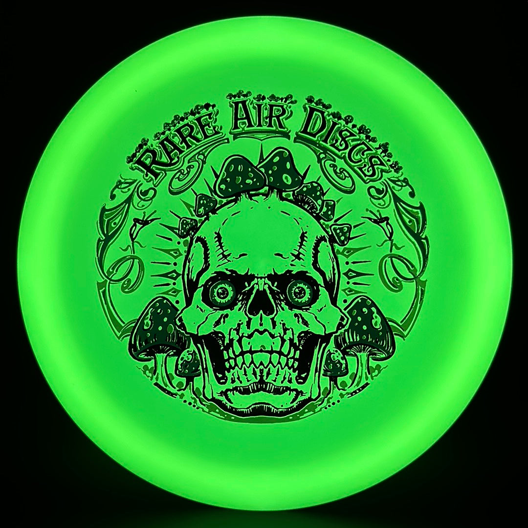 Forged Radiant Era Crushin' Amanitas disc golf stamp by Manny Trujillo on Rare Air Discs disc golf disc with vibrant artwork.