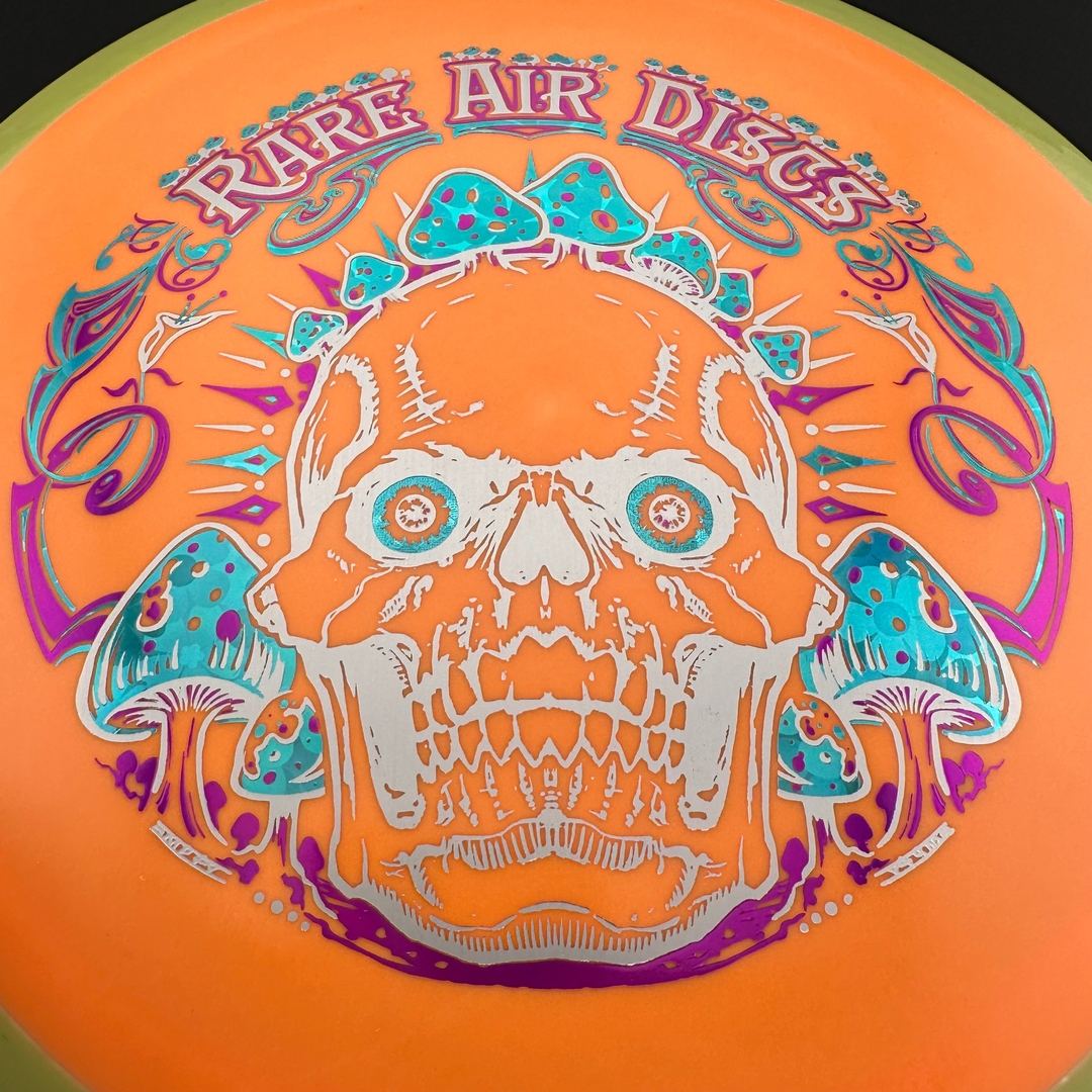 Rare Air Discs Fission Defy Crushin' Amanitas VIP 2.0 disc golf disc with vibrant design and sturdy plastic for reliable throws.