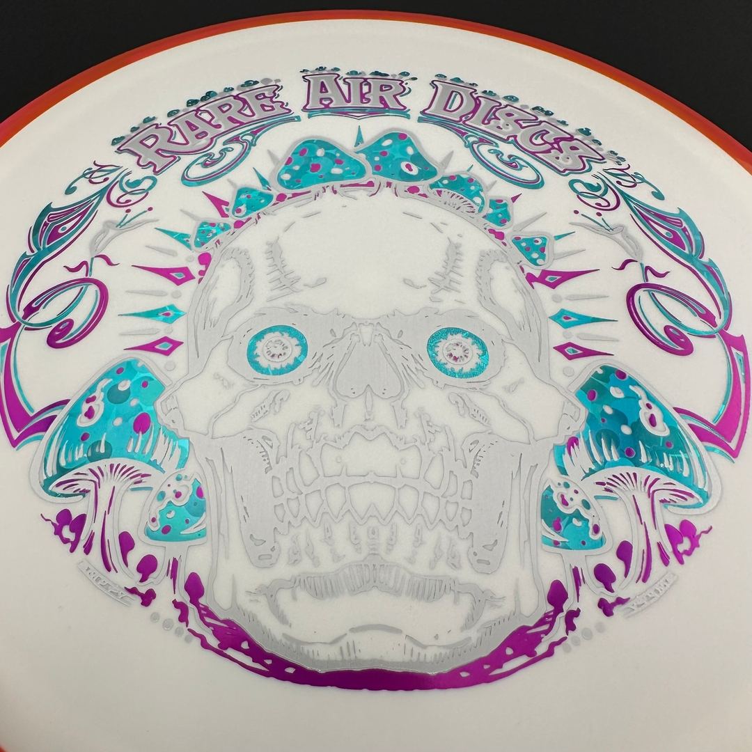 Fission Defy Crushin' Amanitas VIP 2.0 disc golf disc by Rare Air Discs, featuring vibrant artwork and durable plastic.