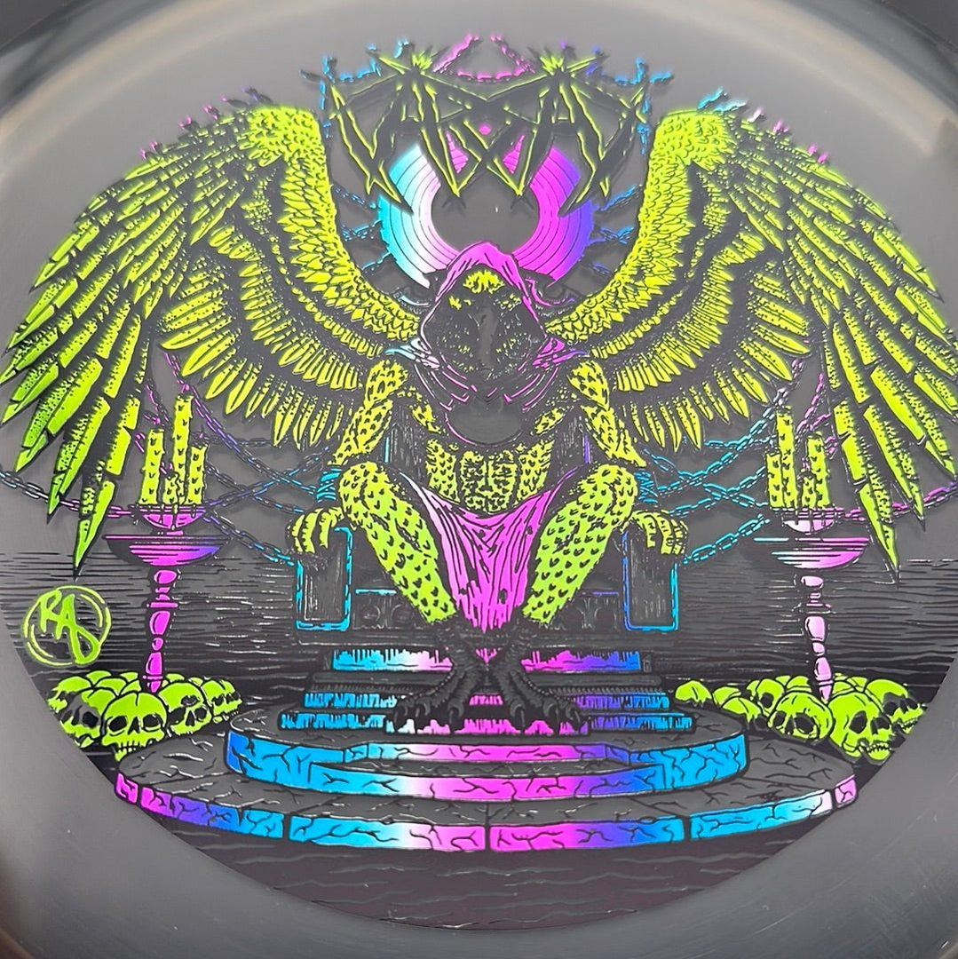 CryZtal Buzzz disc golf disc by Rare Air Discs, featuring Karudi the Overseer design, with a clear CryZtal Buzzz plastic finish.